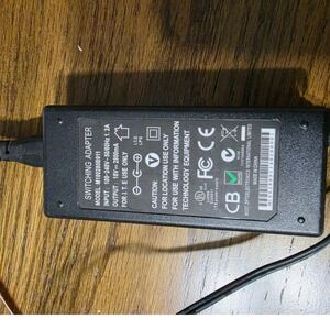 Switching Adapter M180280B911 18V 2800mA AC DC Power Supply Charger Black